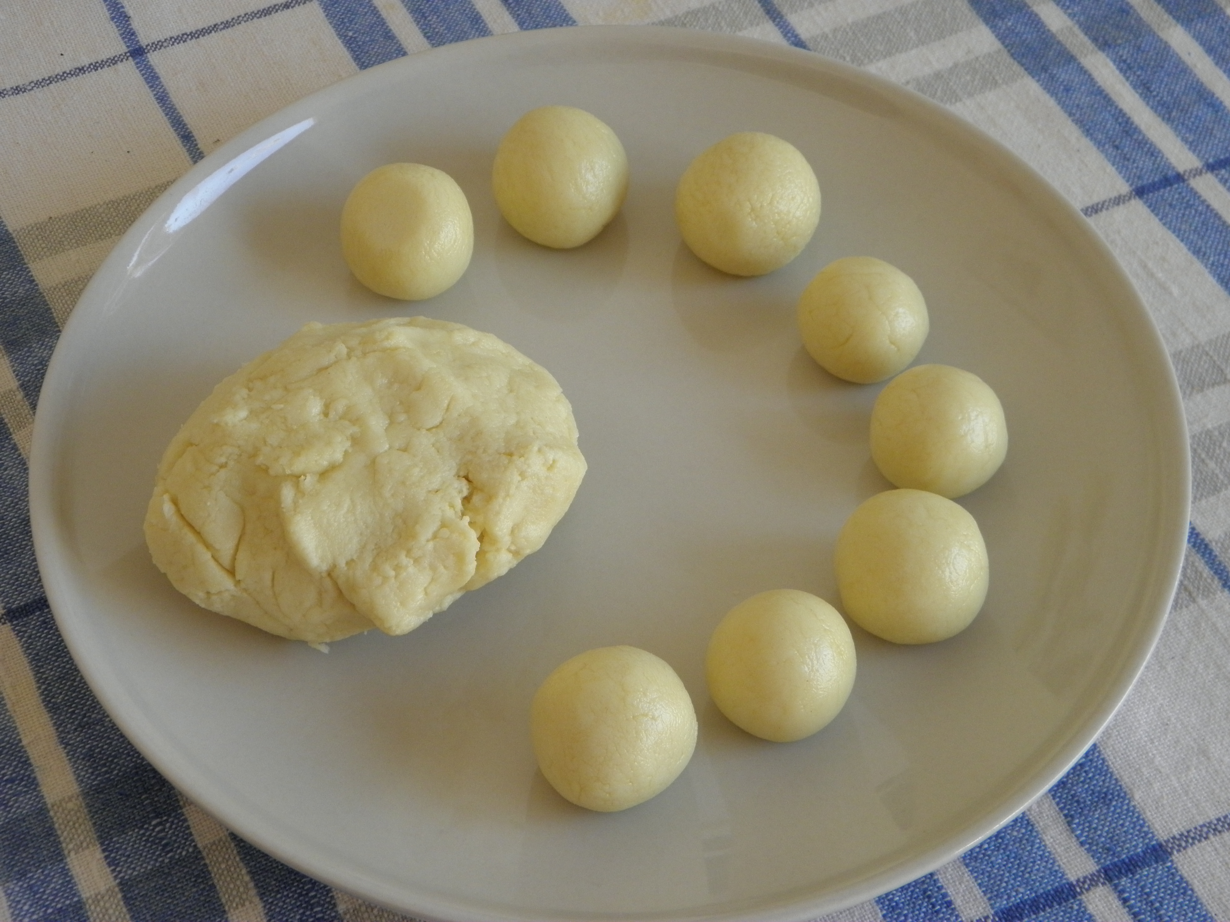 Making of round balls from the dough